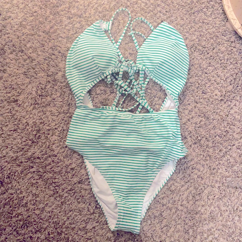 NWT Adorable but sexy one piece cutout suit